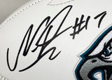 A close-up of the Nakobe Dean Signed Eagles Logo Football by Sports Integrity, featuring a bold black signature with #17 and part of the embroidered teal and black Eagles logo. Authenticated by PSA/DNA with Super Bowl 59 case.