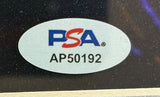An oval sticker with the PSA logo in blue and red appears above the code AP50192, printed in black on a light background, as featured on the Sports Integrity Nick Jonas Signed Framed 8x10 Photo PSA/DNA.