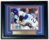 The Sports Integrity Nolan Ryan Signed Framed 8x10 Texas Rangers Ventura Fight Photo shows Ryan in uniform during his famous altercation, includes a Hall of Fame plaque, and is authenticated by BAS.