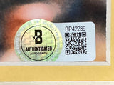 Close-up of a Beckett authenticated autograph sticker with holographic B logo, label BP42289, and QR code on the OJ Simpson Signed Framed 11x14 USC Trojans Photo by Sports Integrity.