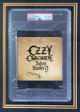 The Sports Integrity Ozzy Osbourne Signed Framed Slabbed Patient Number 9 CD Booklet features a bold black autograph on the cover, authenticated and encapsulated by PSA/DNA for guaranteed authenticity.