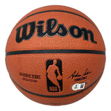 The Sports Integrity Patrick Ewing New York Knicks Signed NBA Wilson I/O Basketball features a textured orange surface, black lines, the NBA logo, product details, and Patrick Ewing's signature.