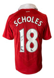 A Paul Scholes signed Manchester United Nike soccer jersey (Sports Integrity), featuring his name and number 18 on the back.