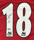 Paul Scholes Signed Manchester United Nike Soccer Jersey by Sports Integrity, featuring a large white number 18 with a black autograph on the "1", two Premier League lion logos, and an authenticity sticker.