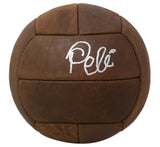 A Sports Integrity Pele Signed Full Size Vintage Brown Throwback Soccer Ball BAS features stitched panels and Pelé’s signature in white ink.