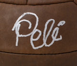 A close-up of the Sports Integrity Pele Signed Full Size Vintage Brown Throwback Soccer Ball, featuring Pelé's signature.