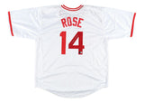 A Sports Integrity Pete Rose Cincinnati white baseball jersey featuring red accents, ROSE and #14 in red on the back, with #14 signed in black marker. BAS authenticated.