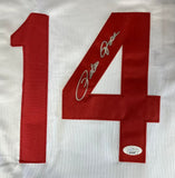 The Sports Integrity Pete Rose Cincinnati Signed White Stat Baseball Jersey JSA features a large red number 14 with Pete Rose's silver autograph and a small authentication sticker on the digit 4.