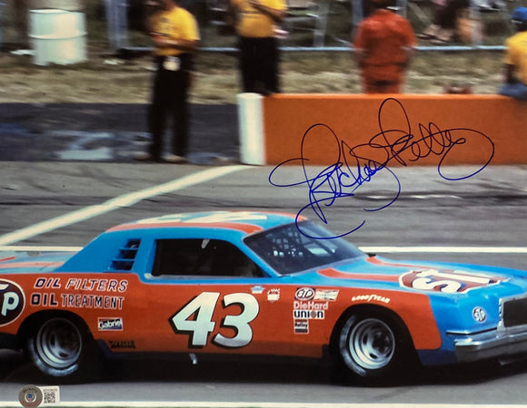 Richard Petty Signed 11x14 NASCAR STP Car Photo BAS Sports Integrity