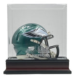 The Sports Integrity Quinyon Mitchell Signed Eagles Mini Speed Helmet comes in a clear acrylic case with a black base featuring "CHAMPIONS" and the Super Bowl LIX logo printed on the front. Authenticated by JSA.