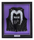 The Sports Integrity Rhea Ripley Signed Framed WWE Judgement Day Vest features black leather with "MAMI" and angel wings in white, signed in white ink, chain and stud accents, all displayed against a purple backdrop.