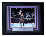 The Sports Integrity Rhea Ripley Signed Framed 8x10 WWE Wrestlemania 39 Photo by Fanatics features Rhea holding a championship belt, with a plaque reading “RHEA RIPLEY ‘Mami’” and the WWE logo.