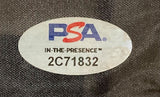 A PSA oval sticker marked IN-THE-PRESENCE™ 2C71832 is shown on a dark, textured surface for the Sports Integrity Robert O'Neill Signed Framed Blue Line American Flag Never Quit with PSA ITP hologram.