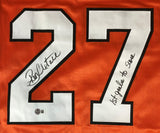 The Sports Integrity Ron Hextall Philadelphia Signed Orange Hockey Jersey features a large white number 27 with black trim, a signature on the left digit, and "1st goalie to score" handwritten on the right.