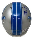 The Sports Integrity Sam LaPorta Signed Detroit Lions Mini Speed Helmet features a silver design with two blue center stripes, Detroit Lions logos on each side, and Sam LaPorta's signature in blue ink on the top right.