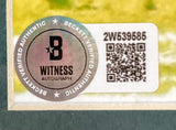A close-up of a Beckett Witness Autograph sticker with QR code and serial number 2W539585 on the Sports Integrity Saquon Barkley Signed Framed 16x20 Philadelphia Eagles Photo, confirming verified authenticity.