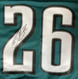 The Sports Integrity Saquon Barkley Signed Philadelphia Eagles Nike Green Game Replica Jersey features a large white and black "26" and Barkley's black autograph on the upper left of the 2.