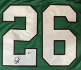 The Sports Integrity Saquon Barkley Philadelphia Kelly Green Football Jersey (Rookie Era) features large white numbers 26 outlined in black, with the number 2 signed and a BAS authentication sticker below it.