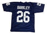 The Sports Integrity Saquon Barkley Penn State Signed Navy Blue Football Jersey features white "Barkley" and 26, a marker autograph on the back number, and 26 on both sleeves. Certified by PSA/DNA.