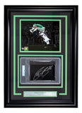 Sports Integrity's Saquon Barkley Signed Framed Cut Sig features an 8x10 Eagles reverse hurdle photo, a signed plaque, and a descriptive nameplate—authenticity certified by PSA/DNA.