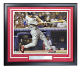 Sports Integrity presents a Scott Rolen signed, framed 16x20 photo of him batting in a grey St. Louis Cardinals uniform, with a red and black frame and silver nameplate. Includes an MLB hologram for authenticity.
