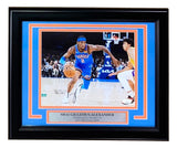 Sports Integrity’s Shai Gilgeous-Alexander Signed Framed 8x10 OKC Thunder Photo features the star dribbling past a defender, includes a JSA Hologram, and is perfect for Thunder fans.