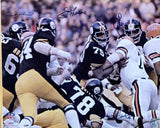 The Sports Integrity Greene Holmes Greenwood White Signed Framed 16x20 Steel Curtain Photo features Steelers legends in black and yellow tackling a player in white, autographed by several players with the NFL logo visible. PSA LOA included.