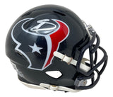 The Stefon Diggs Signed Houston Texans Mini Speed Helmet by Sports Integrity features a black shell with a white, red, and silver bull logo and star, black facemask, and white chin strap.