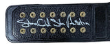 The Sports Integrity Stone Cold Steve Austin WWE Signed Full Size Replica Winged Eagle Belt features a black leather strap with twelve gold rivets in two rows and a white “Stone Cold Steve Austin” signature.