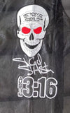 The Sports Integrity Stone Cold Steve Austin Signed Framed WWE Skull Vest BAS features a black leather vest with a red-eyed skull, "Stone Cold" text, white autograph, and an Austin 3:16 patch.