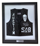 The Stone Cold Steve Austin Signed Framed WWE SOB Vest 2 BAS by Sports Integrity features bold "AUSTIN" and "S.O.B." text, a skull graphic, autograph, and is showcased as unique wrestling memorabilia.