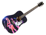The Sports Integrity T Swift Signed 41" Holding Pink Guitar Graphic Acoustic Guitar JSA features a black finish, a graphic of Taylor Swift performing on stage, and her signature near the sound hole.