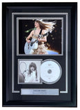 The Sports Integrity Taylor Swift Signed Framed Tortured Poets Photo PSA/DNA includes a performance photo, signed portrait, CD, and an engraved plaque with her name and achievements.