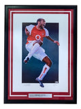 The Sports Integrity Thierry Henry Signed Framed 20x28 Arsenal Soccer Lithograph BAS features the legendary footballer in a red and white jersey with number 14, celebrating, framed with red and white borders and a "Thierry Henry" plaque.