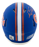 The Tim Tebow Signed Florida Gators Blue Mini Speed Helmet by Sports Integrity features orange and white center stripes, an orange autograph on the top right, plus back stickers and warning labels. Includes a Tebow hologram.