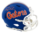 The Sports Integrity Tim Tebow Signed Florida Gators Blue Mini Speed Helmet features "Gators" in orange and white, a white facemask, and Tebow's autograph above the logo with a Tebow hologram.