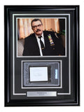 The Sports Integrity Tom Selleck Signed Framed Cut Signature features an 11x14 Blue Bloods photo, autograph, and nameplate on a black background with silver trim; authenticated by PSA/DNA.