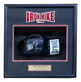 Sports Integrity’s shadowbox showcases a signed left black Everlast boxing glove by Mike Tyson, authenticated by JSA ITP, with a plaque and bold “IRON MIKE TYSON” title celebrating the boxing legend’s achievements.