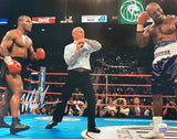 A signed 16x20 photo from Sports Integrity captures the iconic Tyson vs. Holyfield ear bite fight, showing the referee between the boxers—Tyson in black shorts and red gloves, Holyfield in purple leaning on the ropes—before an intense crowd.