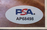Oval PSA/DNA hologram sticker in blue and red above code AP68498, featured on the Uma Thurman Signed Framed 8x10 Pulp Fiction Photo by Sports Integrity.