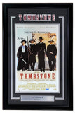 The Sports Integrity Val Kilmer Signed Framed 11x17 Tombstone Poster Photo features four Western-clad characters and includes a Val Kilmer as Doc Holliday nameplate. JSA authenticated.