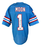 This Sports Integrity Warren Moon Houston signed blue football jersey features red and white stripes, “MOON” and #1 on the back, is inscribed HOF 06, authenticated by BAS, and resembles a classic Oilers-style design.