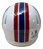 The Sports Integrity Warren Moon Signed Houston Oilers Mini Speed Helmet HOF 06 Inscribed BAS w/ Case features a white shell, a thick red stripe flanked by two thin blue stripes down the center, plus a sticker and QR code on the lower right back.