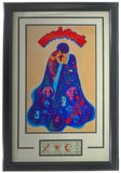 The Sports Integrity Woodstock 11x17 Framed Poster Photo 2 features a couple embracing under red event lettering with blue psychedelic patterns and includes an original full 3-day Woodstock ticket.